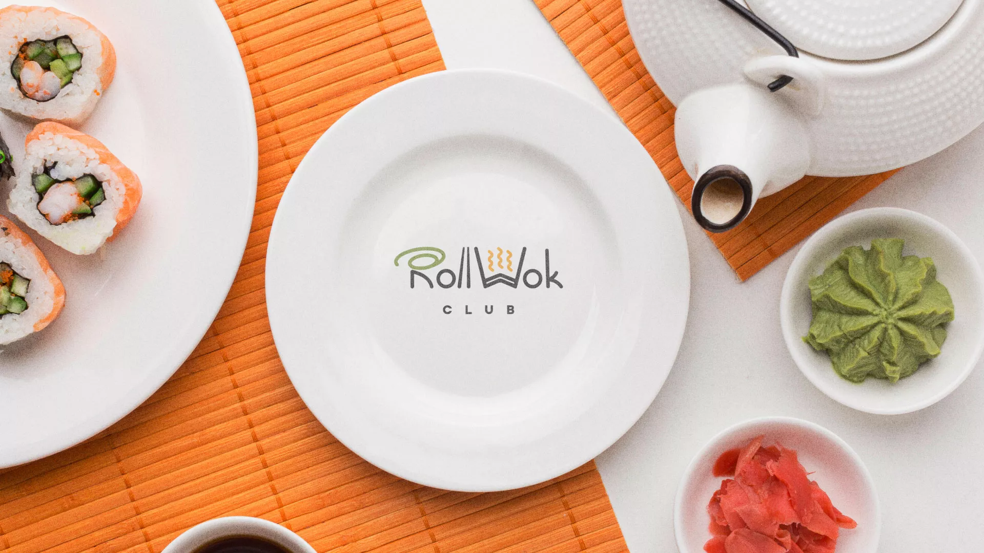 Разработка логотипа и фирменного стиля в Каргате для суши-бара «Roll Wok Club» Разработка логотипа и фирменного стиля в Каргате для суши-бара «Roll Wok Club»